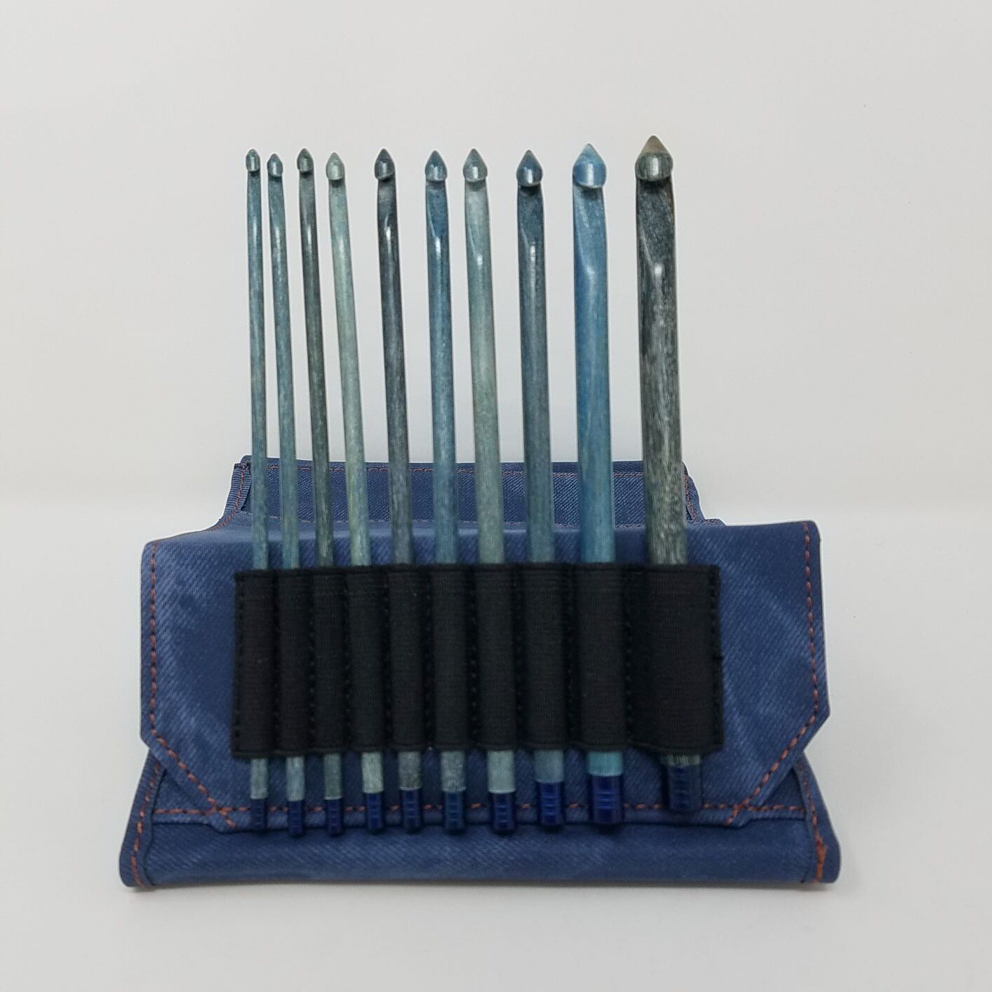 Knitting Needles and Crochet Hooks on Display in a Craft Store